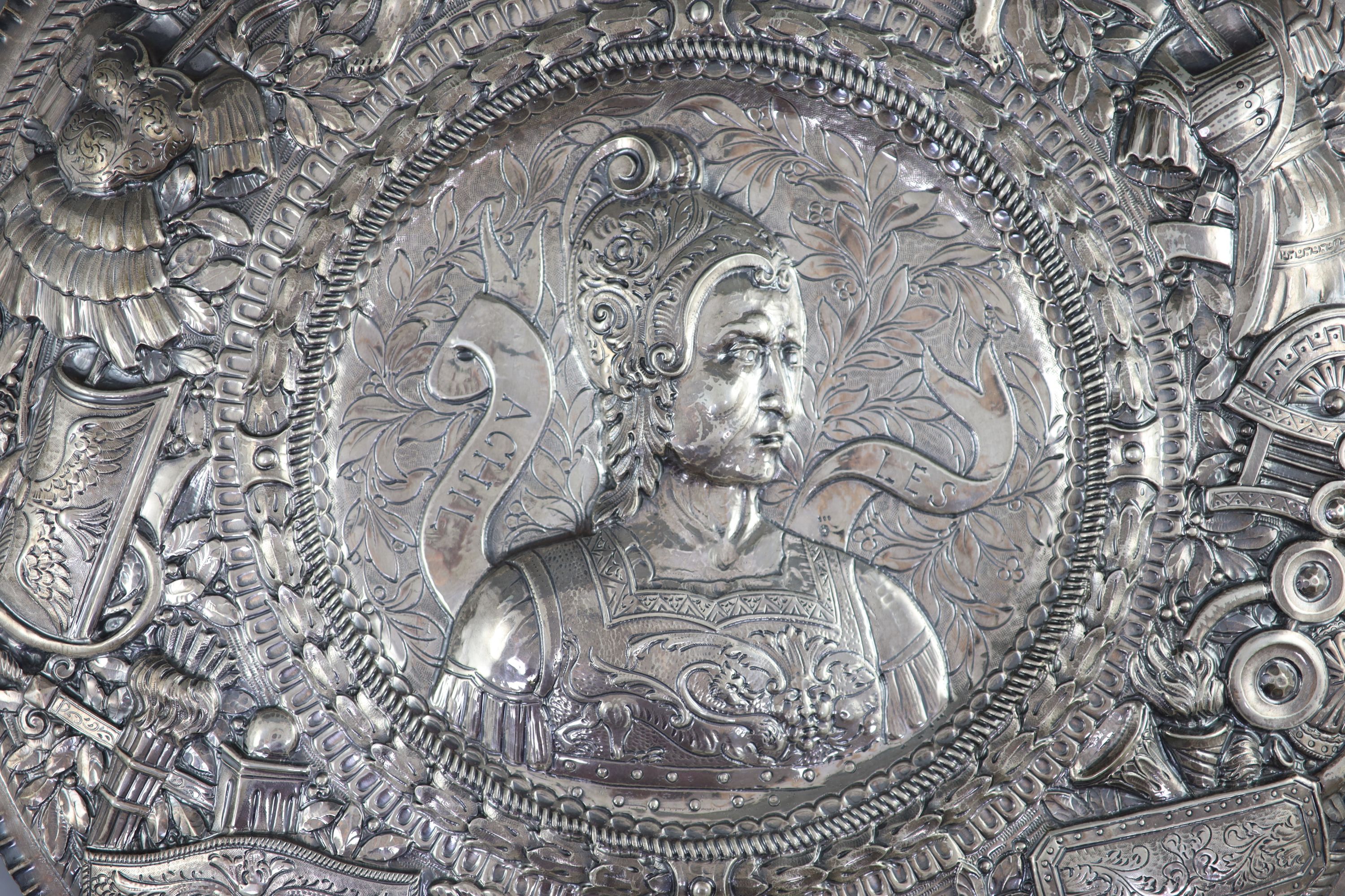 A large late 19th century Italian repousse 800 standard silver charger